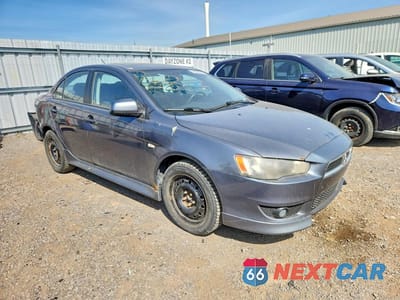 Czwarte zdjęcie samochodu z boku: 2010 MITSUBISHI LANCER ES VIN:JA32U2FU6AU608522 - miniatura