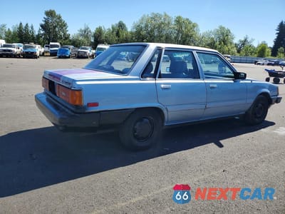 Trzecie zdjęcie samochodu z tyłu: 1986 TOYOTA CAMRY DLX VIN:JT2SV12E0G6025439 - miniatura