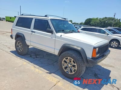 Czwarte zdjęcie samochodu z boku: 1996 JEEP CHEROKEE SE VIN:1J4FJ27S7TL257566 - miniatura