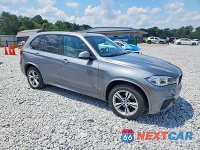 Czwarte zdjęcie samochodu z boku: 2014 BMW X5 XDRIVE35I VIN:5UXKR0C57E0H23178 - miniatura