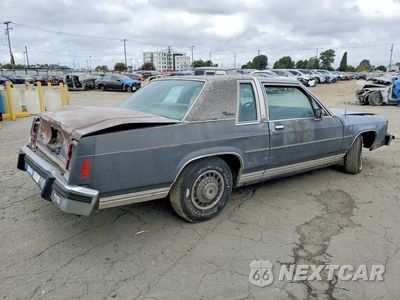 Trzecie zdjęcie samochodu z tyłu: 1987 FORD CROWN VICTORIA LX VIN:2FABP71F3HX114061 - miniatura