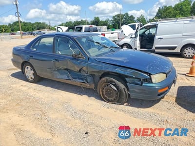 Czwarte zdjęcie samochodu z boku: 1996 TOYOTA CAMRY LE V6 VIN:4T1BF12KXTU862033 - miniatura