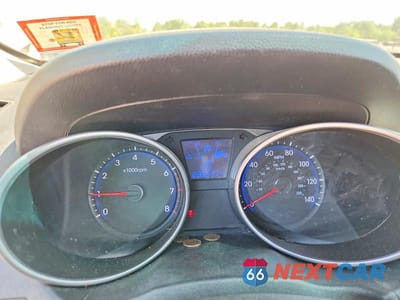 Zdjęcie 9 z 13 samochodu: 2011 HYUNDAI TUCSON GLS VIN:KM8JUCAC4BU300151 - miniatura