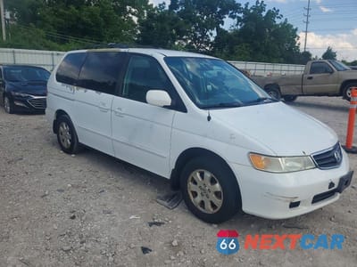 Czwarte zdjęcie samochodu z boku: 2004 HONDA ODYSSEY EXL VIN:5FNRL18974B064051 - miniatura