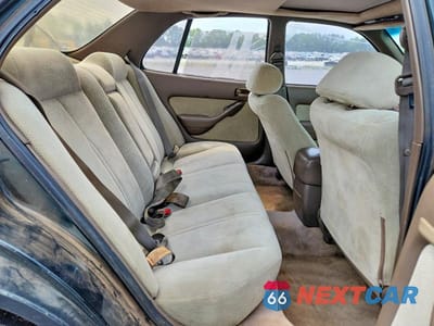 Zdjęcie 10 z 12 samochodu: 1994 TOYOTA CAMRY LE VIN:4T1SK12EXRU350447 - miniatura