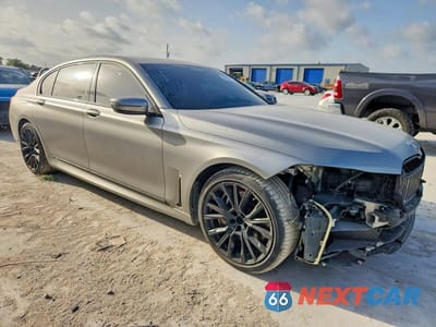 Czwarte zdjęcie samochodu z boku: 2022 BMW 750 XI VIN:WBA7U2C03NCJ48155 - miniatura