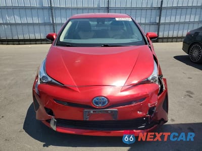 Piąte zdjęcie samochodu w środku: 2017 TOYOTA PRIUS TWO VIN:JTDKBRFU5H3559250 - miniatura