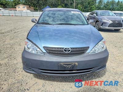 Piąte zdjęcie samochodu w środku: 2004 TOYOTA CAMRY LE VIN:JTDBE32K340297653 - miniatura
