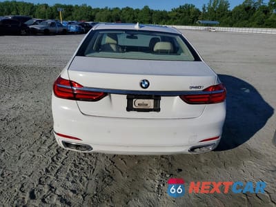 Zdjęcie 6 z 12 samochodu: 2016 BMW 740 I VIN:WBA7E2C57GGD99896 - miniatura