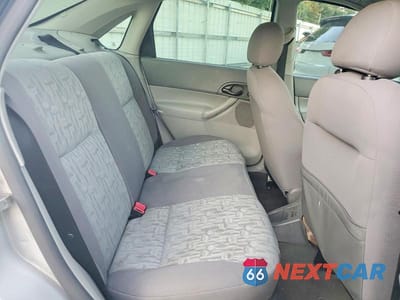 Zdjęcie 10 z 12 samochodu: 2005 FORD FOCUS ZX4 VIN:1FAFP34N05W220410 - miniatura