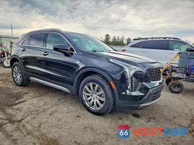 Czwarte zdjęcie samochodu z boku: 2019 CADILLAC XT4 PREMIUM LUXURY VIN:1GYFZDR47KF210599 - miniatura