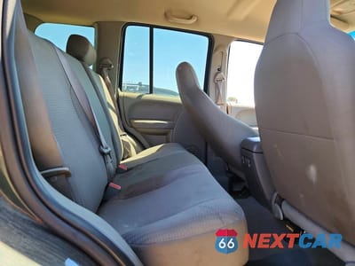 Zdjęcie 11 z 13 samochodu: 2003 JEEP LIBERTY SPORT VIN:1J4GL48K23W554865 - miniatura