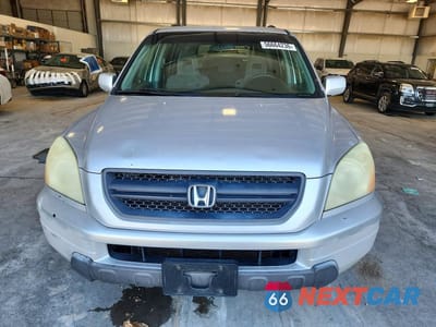 Piąte zdjęcie samochodu w środku: 2003 HONDA PILOT EX VIN:2HKYF18453H613527 - miniatura