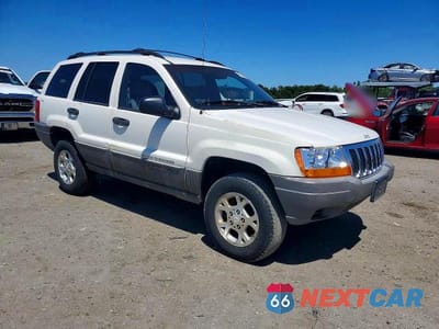 Czwarte zdjęcie samochodu z boku: 1999 JEEP GRAND CHEROKEE LAREDO VIN:1J4GW58S1XC501613 - miniatura