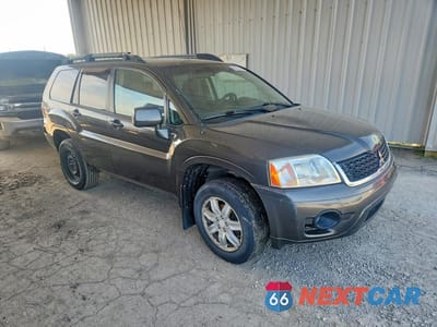 Czwarte zdjęcie samochodu z boku: 2010 MITSUBISHI ENDEAVOR LS VIN:4A4JM2AS2AE013432 - miniatura