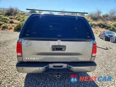 Zdjęcie 6 z 12 samochodu: 2015 NISSAN TITAN PRO-4X VIN:1N6BA0EC9FN510090 - miniatura