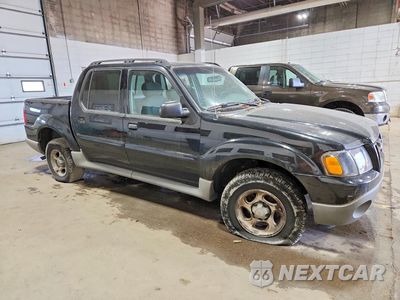 Czwarte zdjęcie samochodu z boku: 2003 FORD EXPLORER SPORT TRAC VIN:1FMZU77E83UB75403 - miniatura