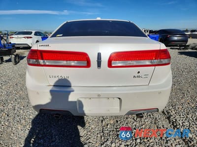 Zdjęcie 6 z 12 samochodu: 2010 LINCOLN MKZ VIN:3LNHL2GC2AR640813 - miniatura