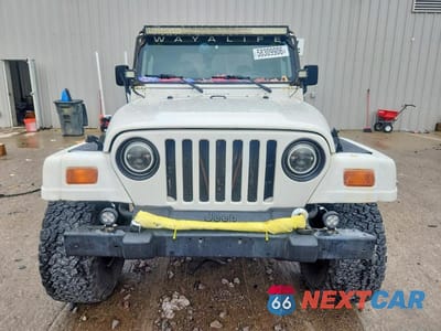 Piąte zdjęcie samochodu w środku: 1999 JEEP WRANGLER / TJ SAHARA VIN:1J4FY49S9XP465466 - miniatura