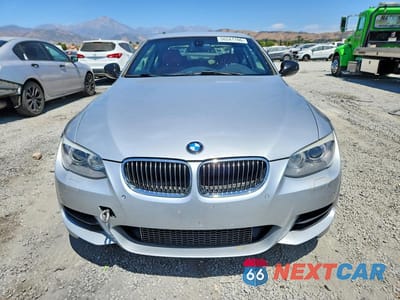 Piąte zdjęcie samochodu w środku: 2011 BMW 335 IS VIN:WBAKG1C52BE617999 - miniatura