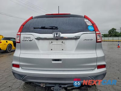 Zdjęcie 6 z 13 samochodu: 2016 HONDA CR-V LX VIN:5J6RM4H34GL078124 - miniatura