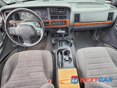 Zdjęcie 8 z 13 samochodu: 1998 JEEP GRAND CHEROKEE LAREDO VIN:1J4GZ58SXWC372695 - miniatura