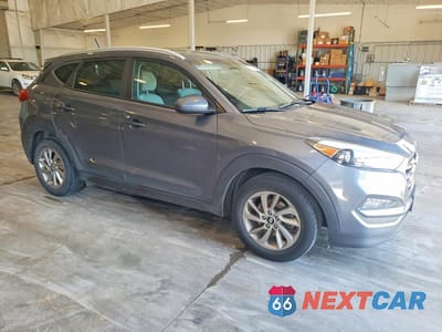 Czwarte zdjęcie samochodu z boku: 2016 HYUNDAI TUCSON SE VIN:KM8J3CA40GU092594 - miniatura