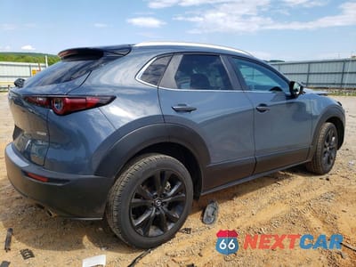 Trzecie zdjęcie samochodu z tyłu: 2023 MAZDA CX-30 PREFERRED VIN:3MVDMBCM5PM507496 - miniatura