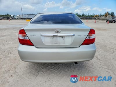 Zdjęcie 6 z 12 samochodu: 2002 TOYOTA CAMRY LE VIN:4T1BE32K52U029284 - miniatura
