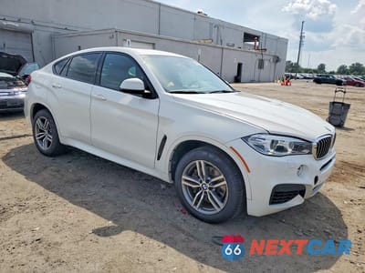 Czwarte zdjęcie samochodu z boku: 2015 BMW X6 XDRIVE50I VIN:5UXKU6C52F0F94334 - miniatura