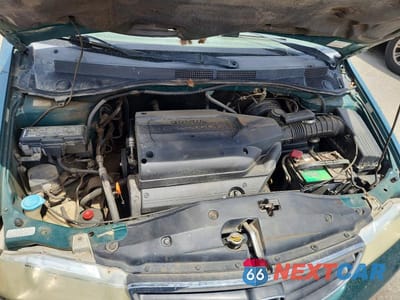 Zdjęcie 12 z 13 samochodu: 2002 HONDA ODYSSEY EX VIN:2HKRL18602H519343 - miniatura