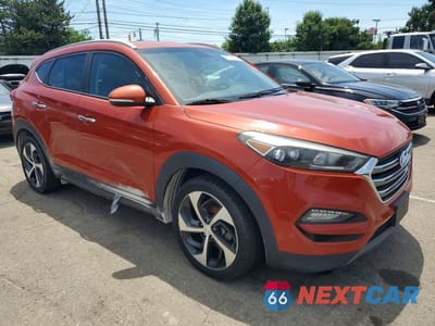 Czwarte zdjęcie samochodu z boku: 2016 HYUNDAI TUCSON LIMITED VIN:KM8J33A29GU230664 - miniatura