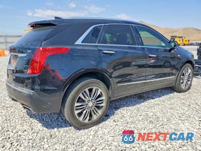 Trzecie zdjęcie samochodu z tyłu: 2018 CADILLAC XT5 PREMIUM LUXURY VIN:1GYKNFRSXJZ198644 - miniatura