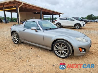 Czwarte zdjęcie samochodu z boku: 2010 MAZDA MX-5 MIATA VIN:JM1NC2FF1A0212329 - miniatura