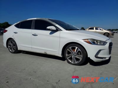 Czwarte zdjęcie samochodu z boku: 2017 HYUNDAI ELANTRA LIMITED VIN:5NPD84LF3HH070415 - miniatura