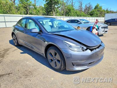 Czwarte zdjęcie samochodu z boku: 2023 TESLA MODEL 3 VIN:5YJ3E1EA9PF585405 - miniatura