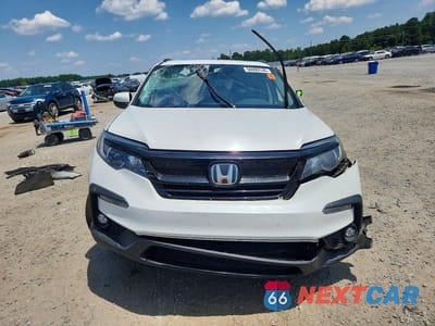 Piąte zdjęcie samochodu w środku: 2021 HONDA PILOT SE VIN:5FNYF5H29MB030254 - miniatura
