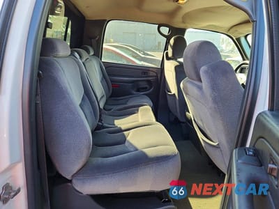 Zdjęcie 11 z 13 samochodu: 2004 GMC SIERRA VIN:1GTHK232X4F214597 - miniatura