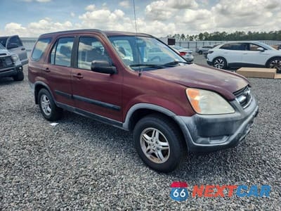Czwarte zdjęcie samochodu z boku: 2004 HONDA CR-V LX VIN:JHLRD68564C016774 - miniatura