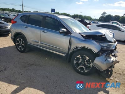 Czwarte zdjęcie samochodu z boku: 2018 HONDA CR-V TOURING VIN:7FARW1H90JE053917 - miniatura