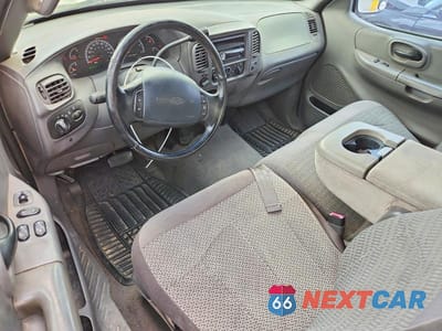 Zdjęcie 8 z 12 samochodu: 2000 FORD F150 VIN:1FTRX18L5YKB02966 - miniatura