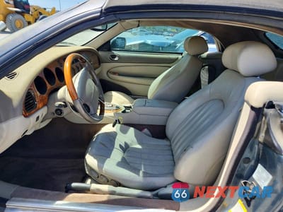 Zdjęcie 7 z 12 samochodu: 2001 JAGUAR XK8 VIN:SAJDA42C31NA11063 - miniatura
