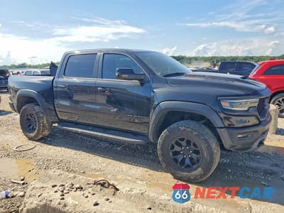 Czwarte zdjęcie samochodu z boku: 2022 RAM 1500 TRX VIN:1C6SRFU9XNN403642 - miniatura