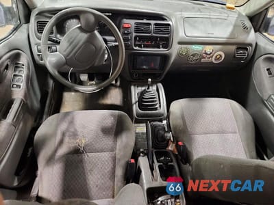 Zdjęcie 8 z 13 samochodu: 1999 CHEVROLET TRACKER VIN:2CNBJ13C0X6932410 - miniatura