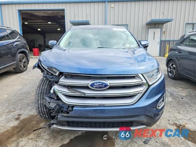 Piąte zdjęcie samochodu w środku: 2018 FORD EDGE TITANIUM VIN:2FMPK4K95JBB57353 - miniatura