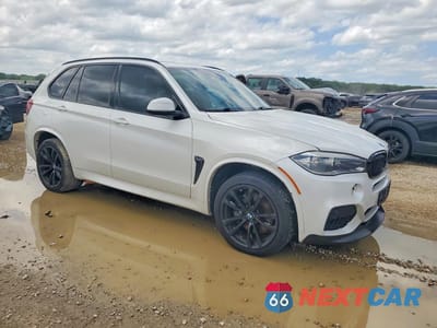 Czwarte zdjęcie samochodu z boku: 2014 BMW X5 XDRIVE50I VIN:5UXKR6C57E0J72170 - miniatura