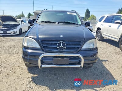 Piąte zdjęcie samochodu w środku: 2000 MERCEDES-BENZ ML 430 VIN:4JGAB72E2YA159622 - miniatura