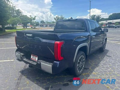Czwarte zdjęcie samochodu z boku: 2023 TOYOTA TUNDRA LIMITED HV VIN:5TFJC5DB2PX036925 - miniatura