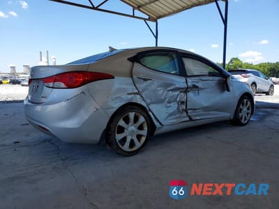Trzecie zdjęcie samochodu z tyłu: 2012 HYUNDAI ELANTRA LIMITED VIN:KMHDH4AE9CU304979 - miniatura