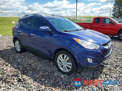 Czwarte zdjęcie samochodu z boku: 2013 HYUNDAI TUCSON LIMITED VIN:KM8JUCAC2DU581823 - miniatura